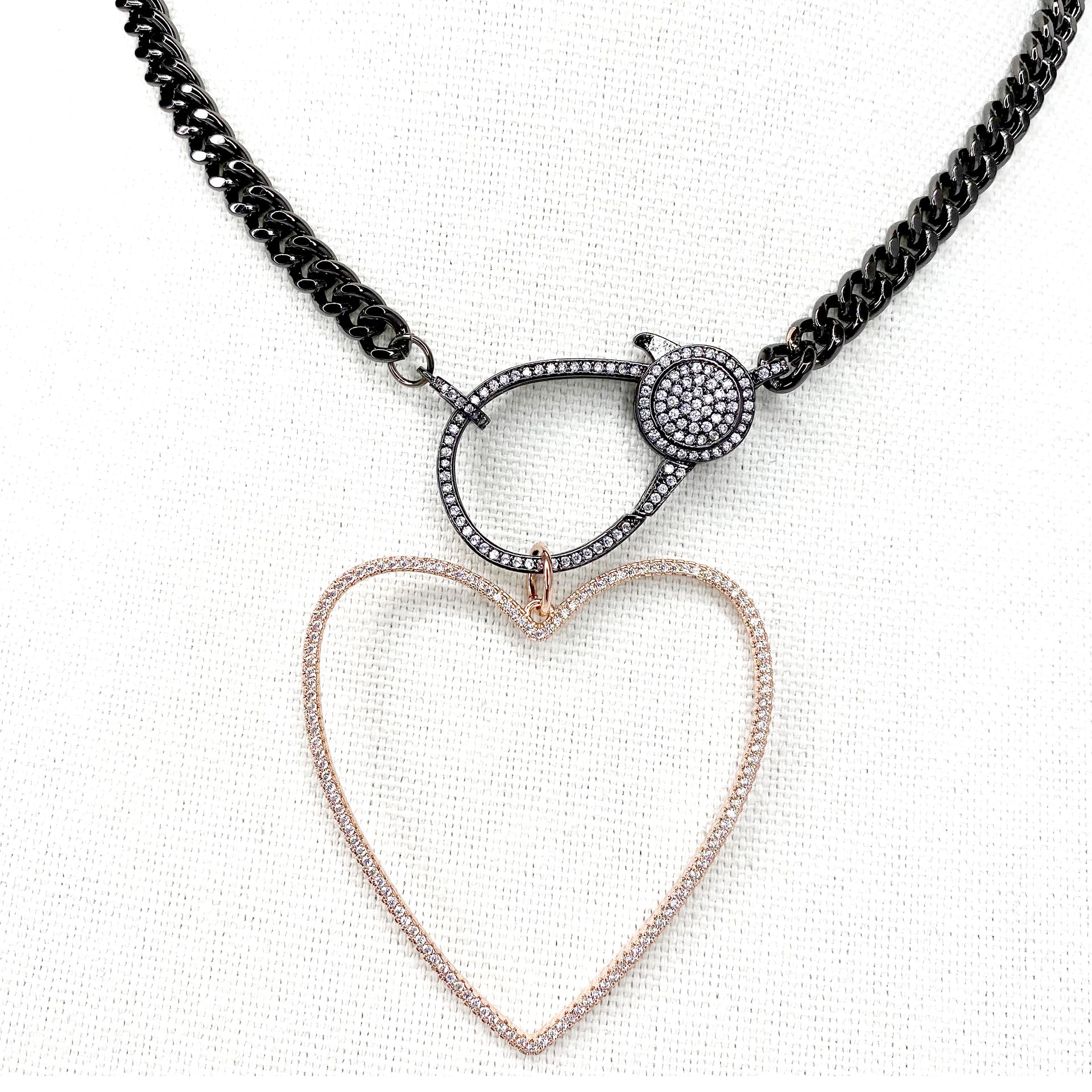 Rose gold open heart charm featuring a soft, romantic outline