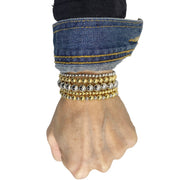 celebrity famous five stack of beaded bracelets gold and silver stacked on wrist by love lisa jewelry