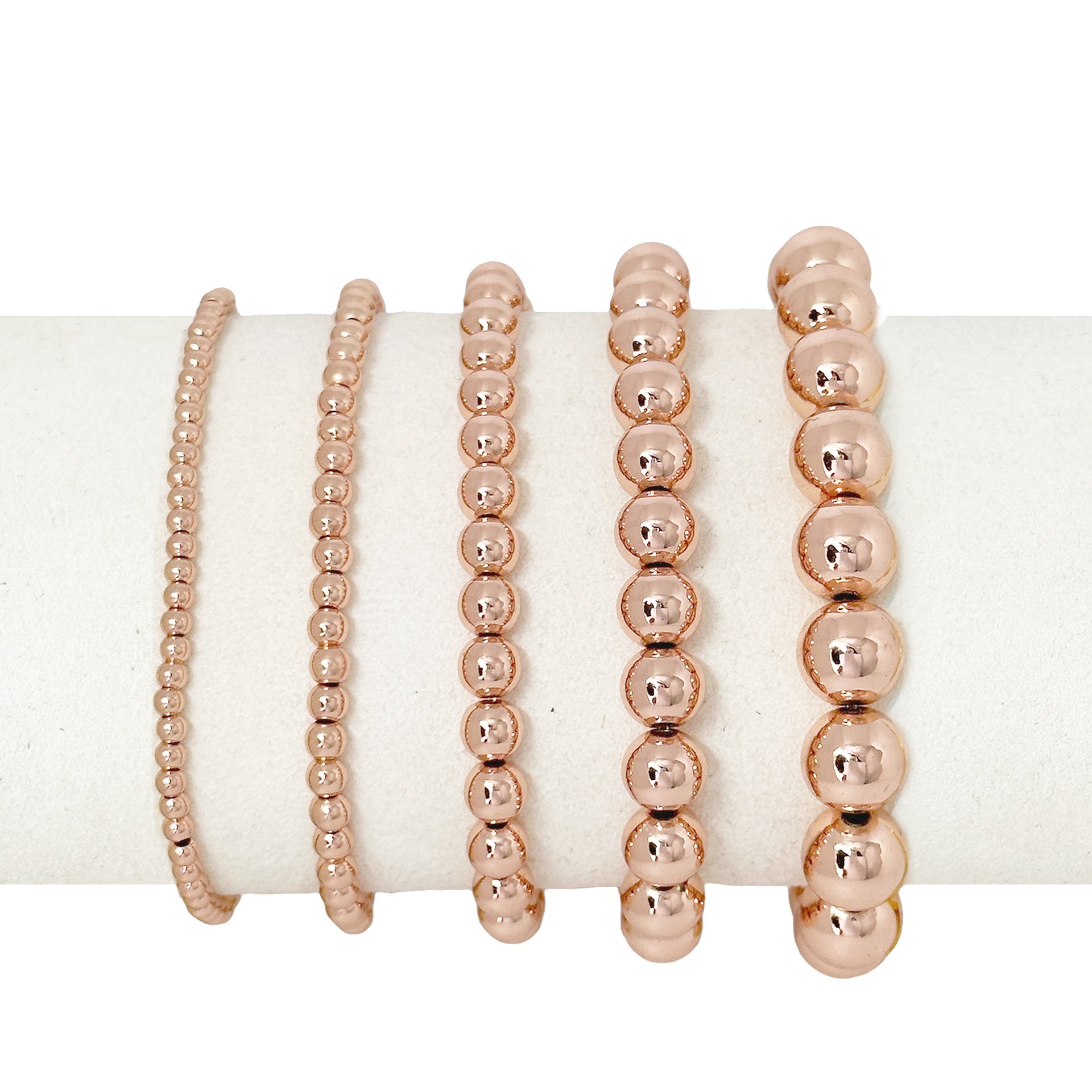celebrity-famous-five-stack-of-beaded-bracelets-rose-gold-love-lisa