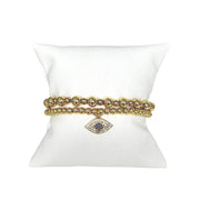 cynthia small eye bracelet gold beaded display pillow with evil eye charm