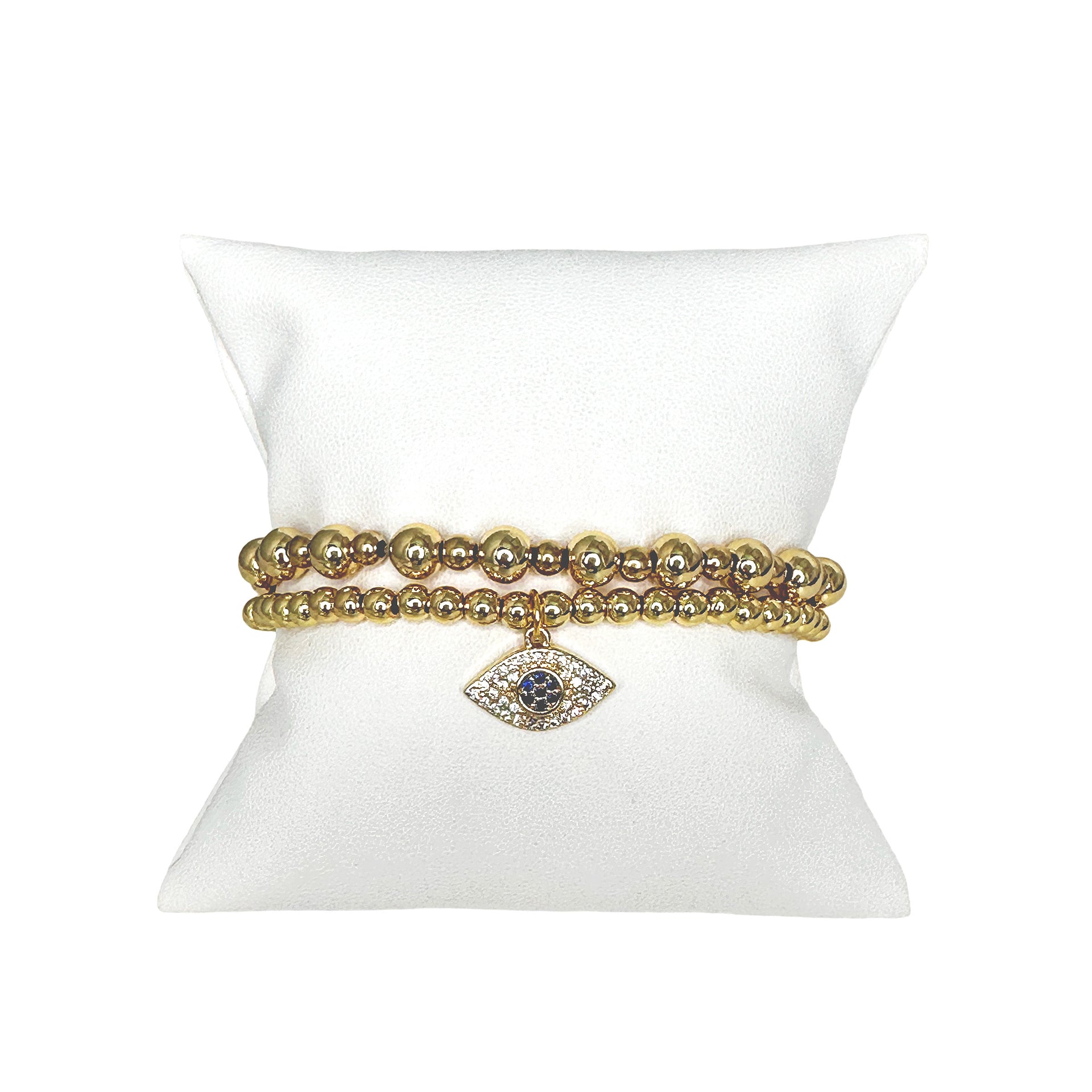 cynthia small eye bracelet gold beaded display pillow with evil eye charm