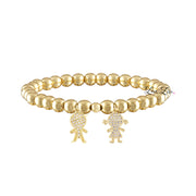gold grandma bracelet with boy and girl charms