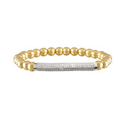 A gold-colored bar-shaped bracelet featuring micro pave brass beads with a sparkling design.