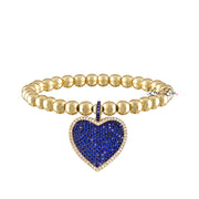 lila allure beaded heart bracelet in gold blue featuring gold tone beads and a deep blue pave heart charm that adds a pop of color