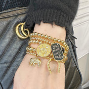 Love Lisa lori lucky lady bracelet collection gold bead bracelets worn on wrist with lucky charms