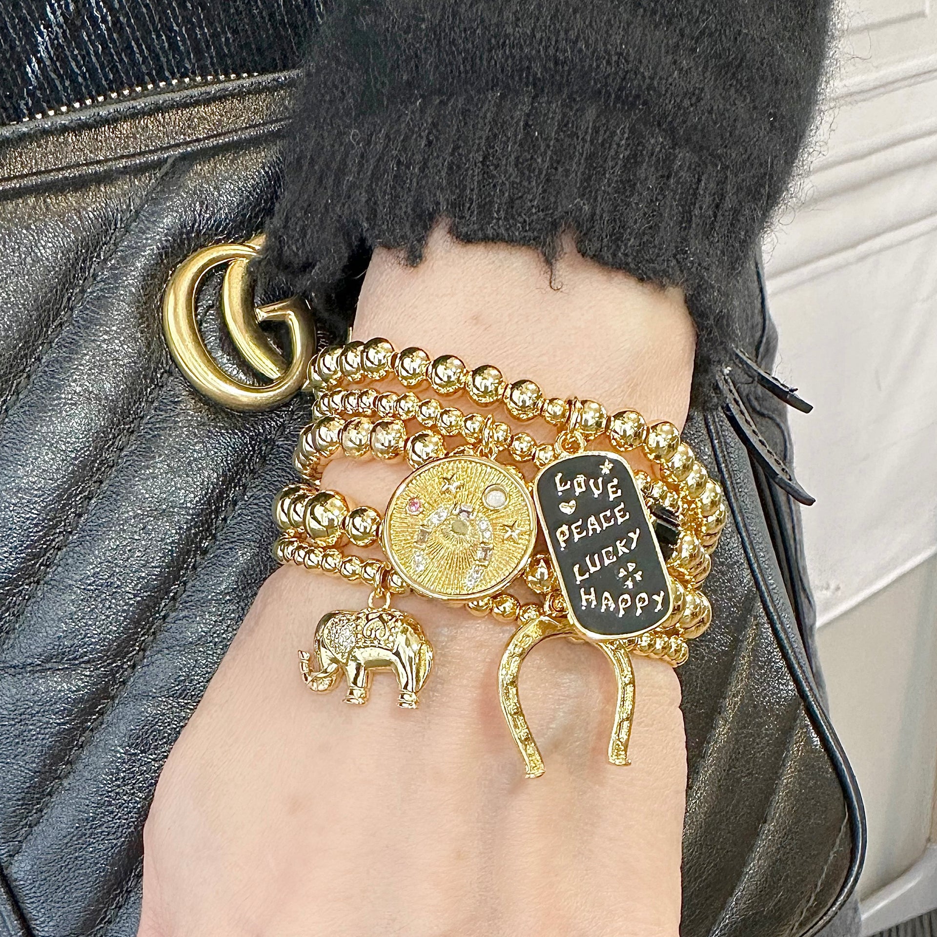 Love Lisa lori lucky lady bracelet collection gold bead bracelets worn on wrist with lucky charms