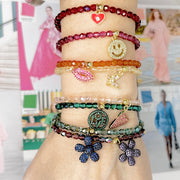 love lisa arm stack wearing madison colorful candy charm bracelets in mixed crystal colors