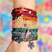 love lisa wrist stack featuring madison colorful candy charm bracelets in multiple colors