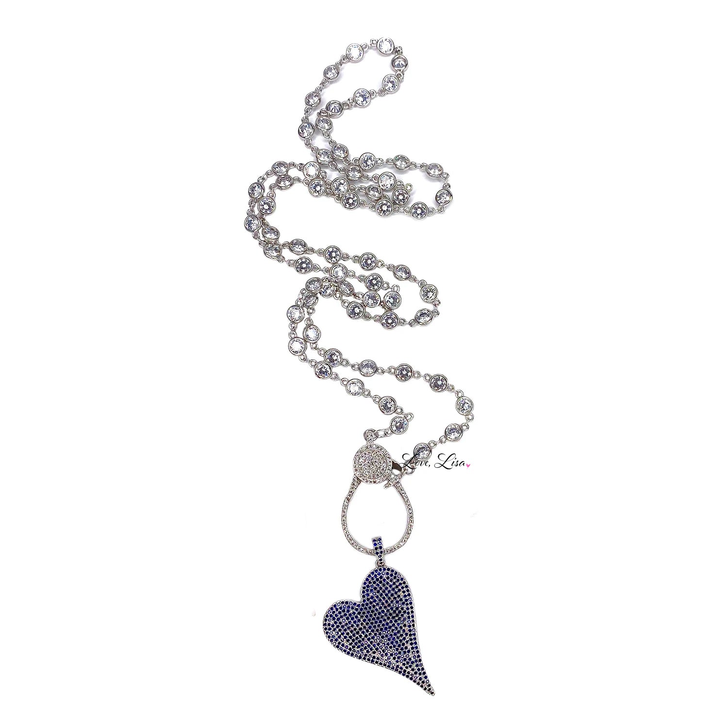 Blue and silver asymmetrical heart pendant with sparkly finish