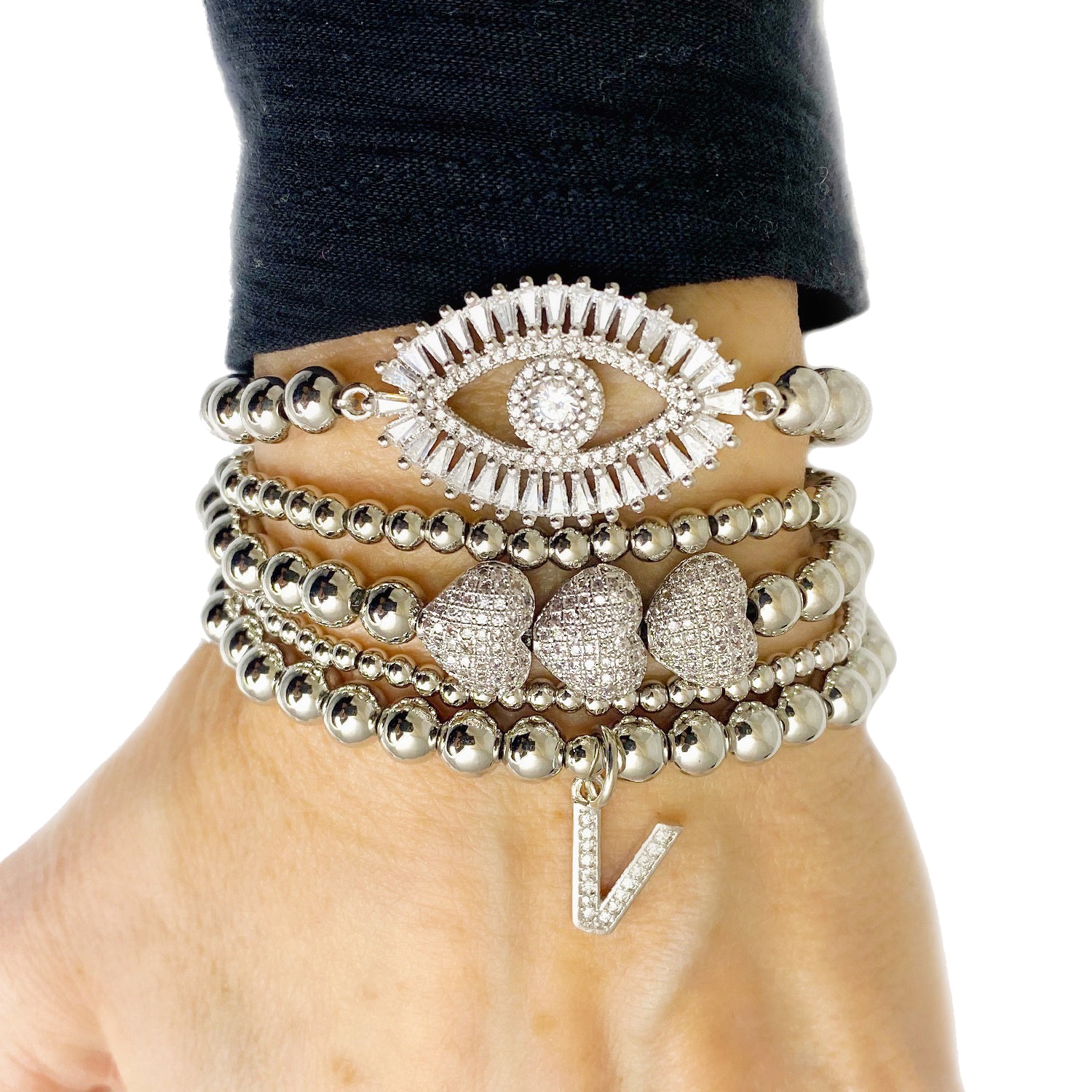 Love Lisa stack of Milania sweet initial personalized beaded bracelets