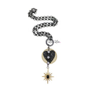  black milly heart necklace with star charm and pave crystals
