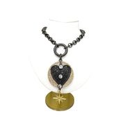  black gunmetal milly heart necklace on display bust