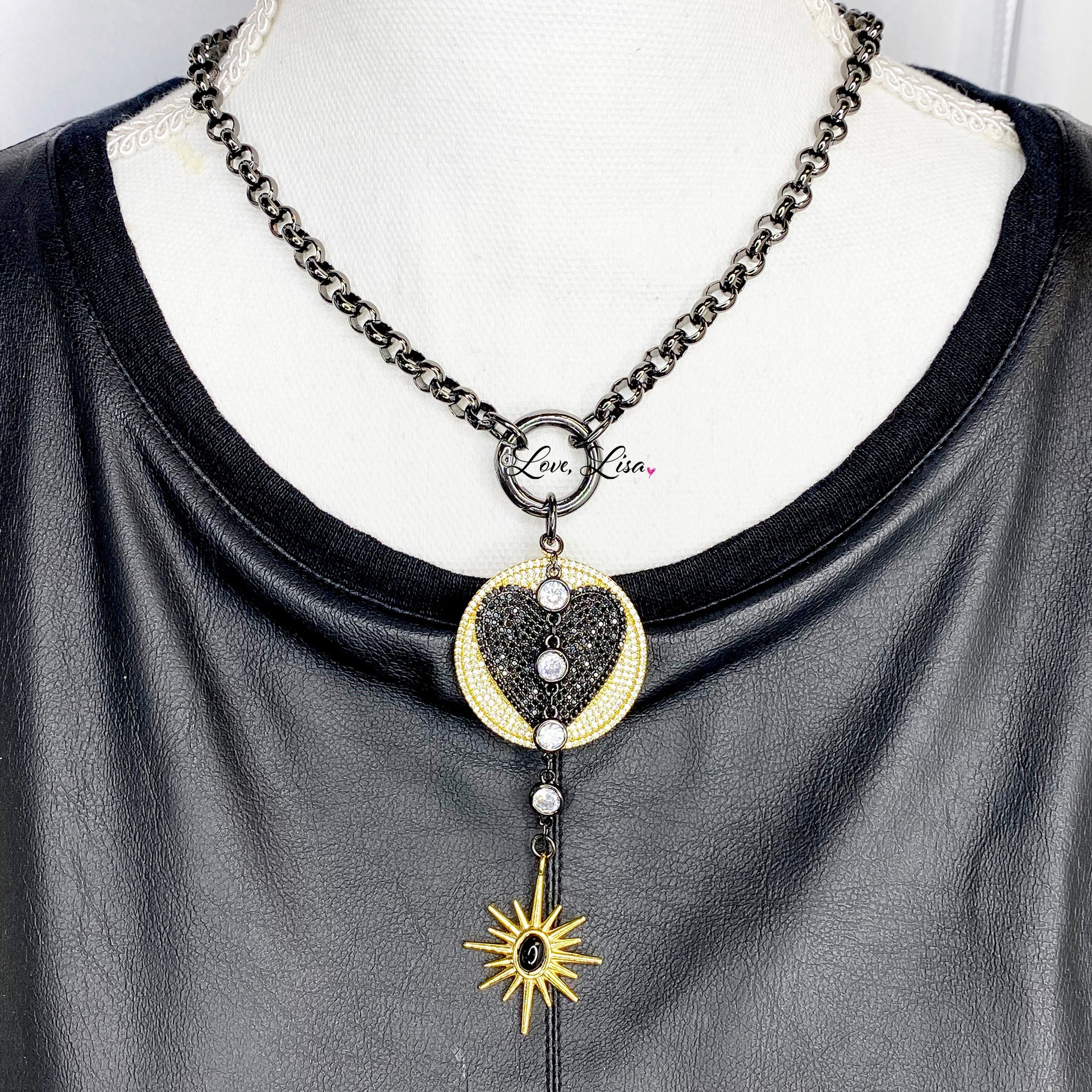  black gunmetal milly heart necklace on display bust