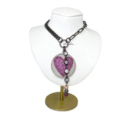 black gunmetal milly heart necklace on display bust