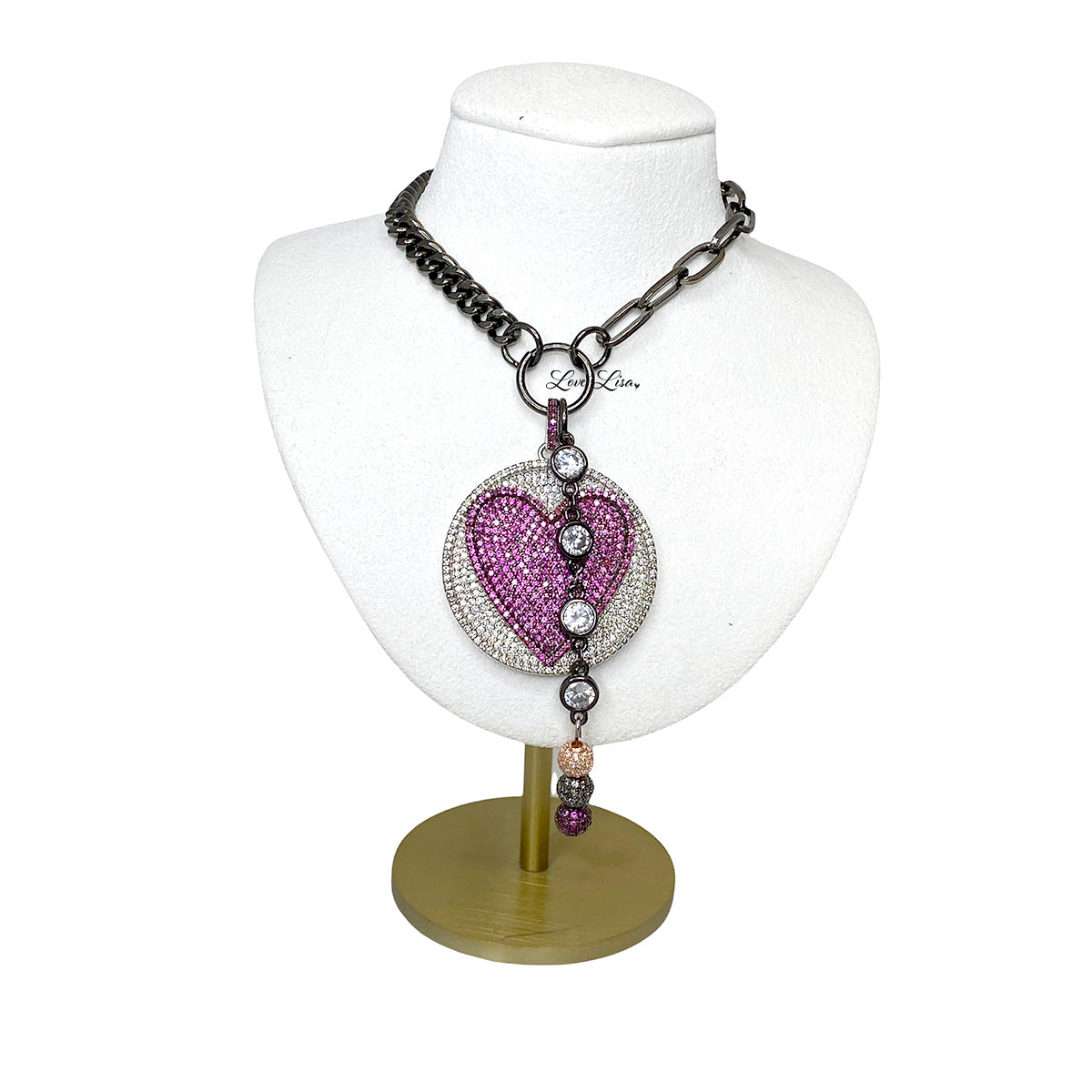black gunmetal milly heart necklace on display bust