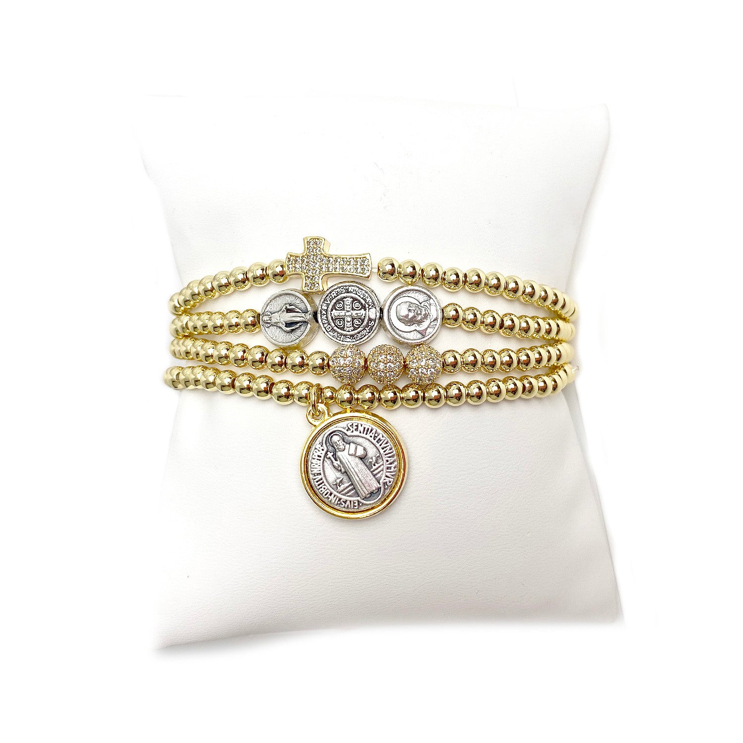 Myra's Religious Saint Stack featuring Saint Benedict, Padre Pio, and Miraculous Medals for spiritual protection and healing