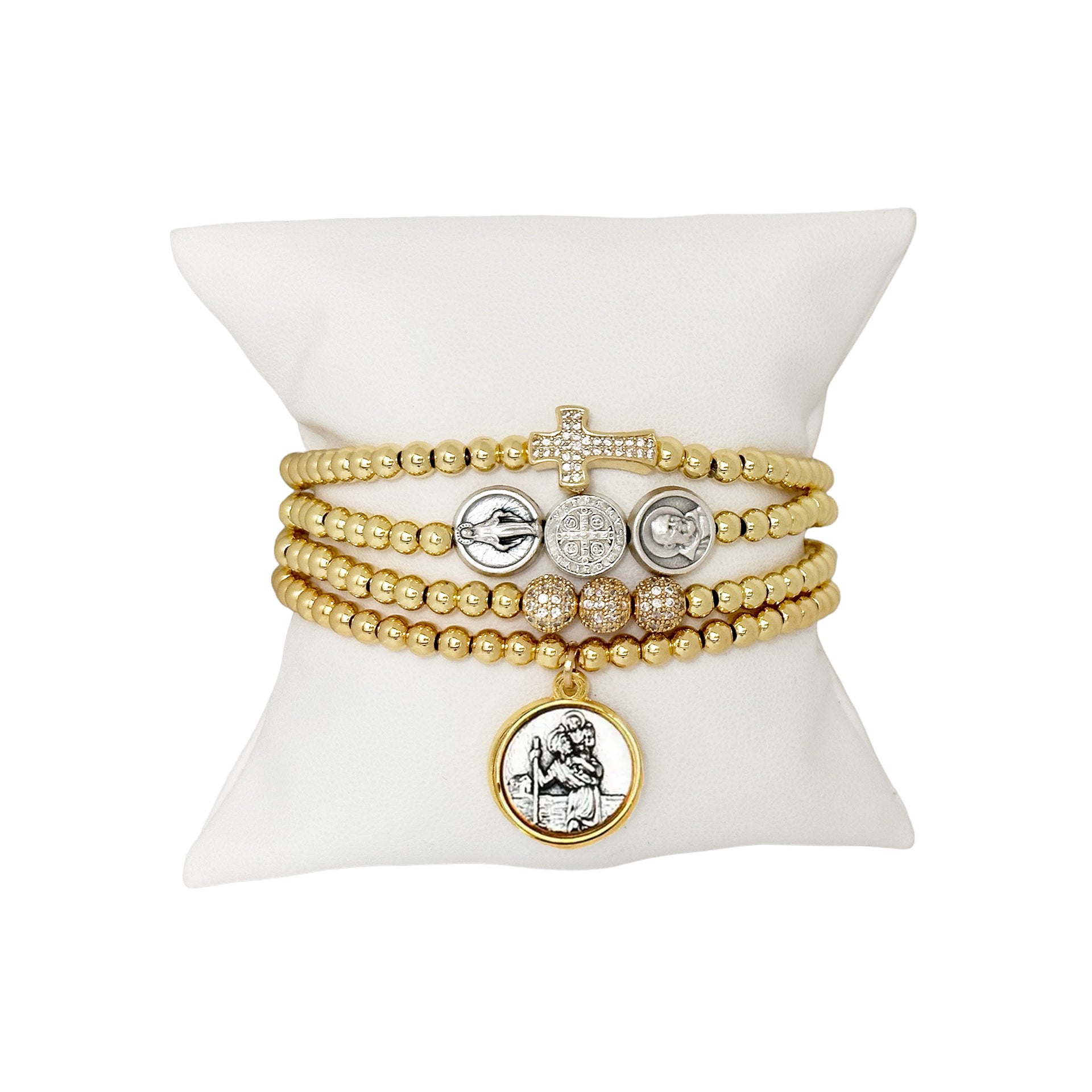 Myra's Religious Saint Stack featuring Saint Christopher, Padre Pio, and Miraculous Medals for spiritual protection and healing