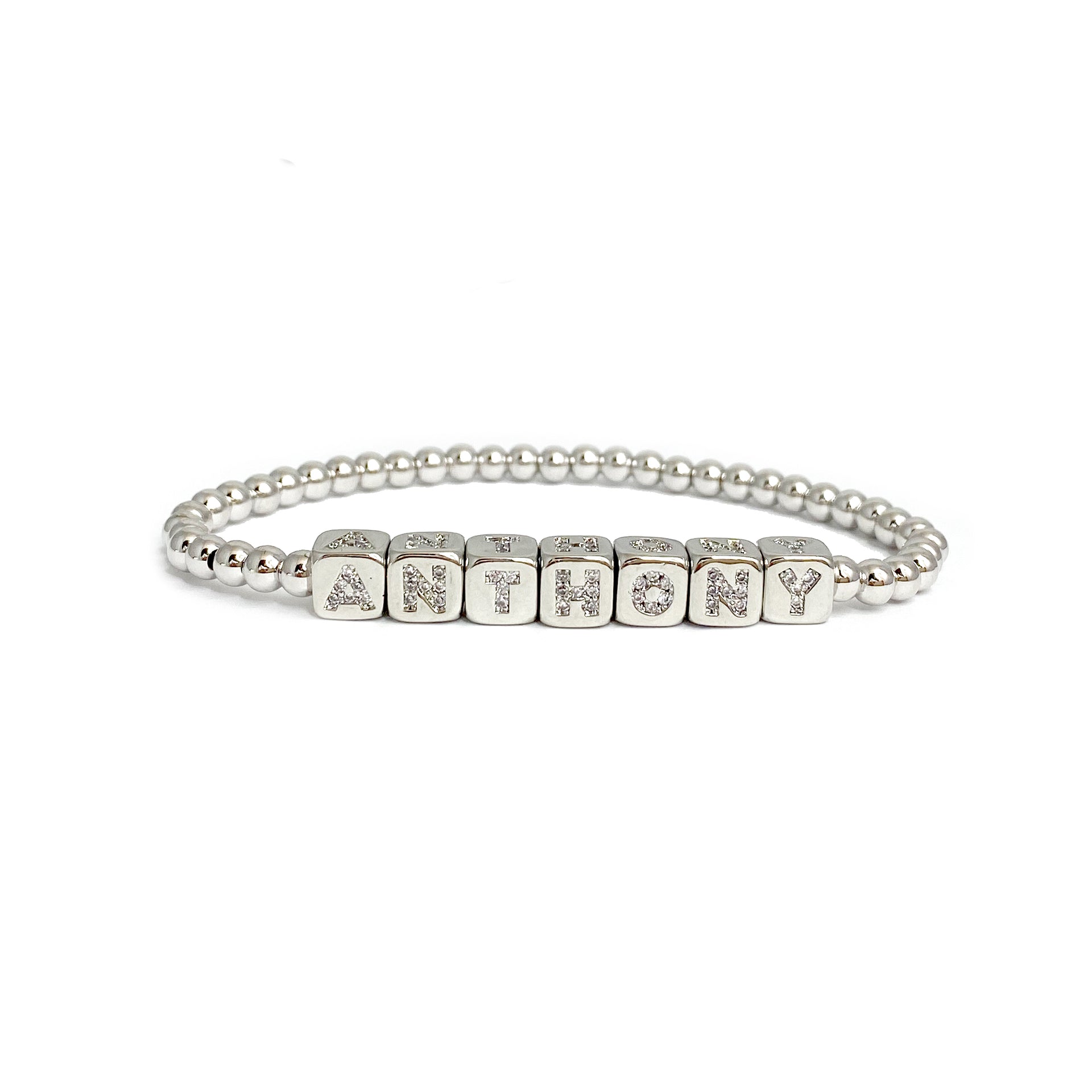 personalized small block letter bracelet in silver with polished 4mm beads and petite letter cubes