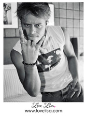 Love Lisa rudy lava rock mens beaded bracelet black lava stretch bracelet on wrist worn by Rudy Pankow, AKA JJ Maybank on the Netflix drama Outer Banks