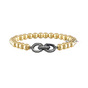 Love Lisa Silvania’s Link Bracelet in gold with gunmetal pavé infinity charm