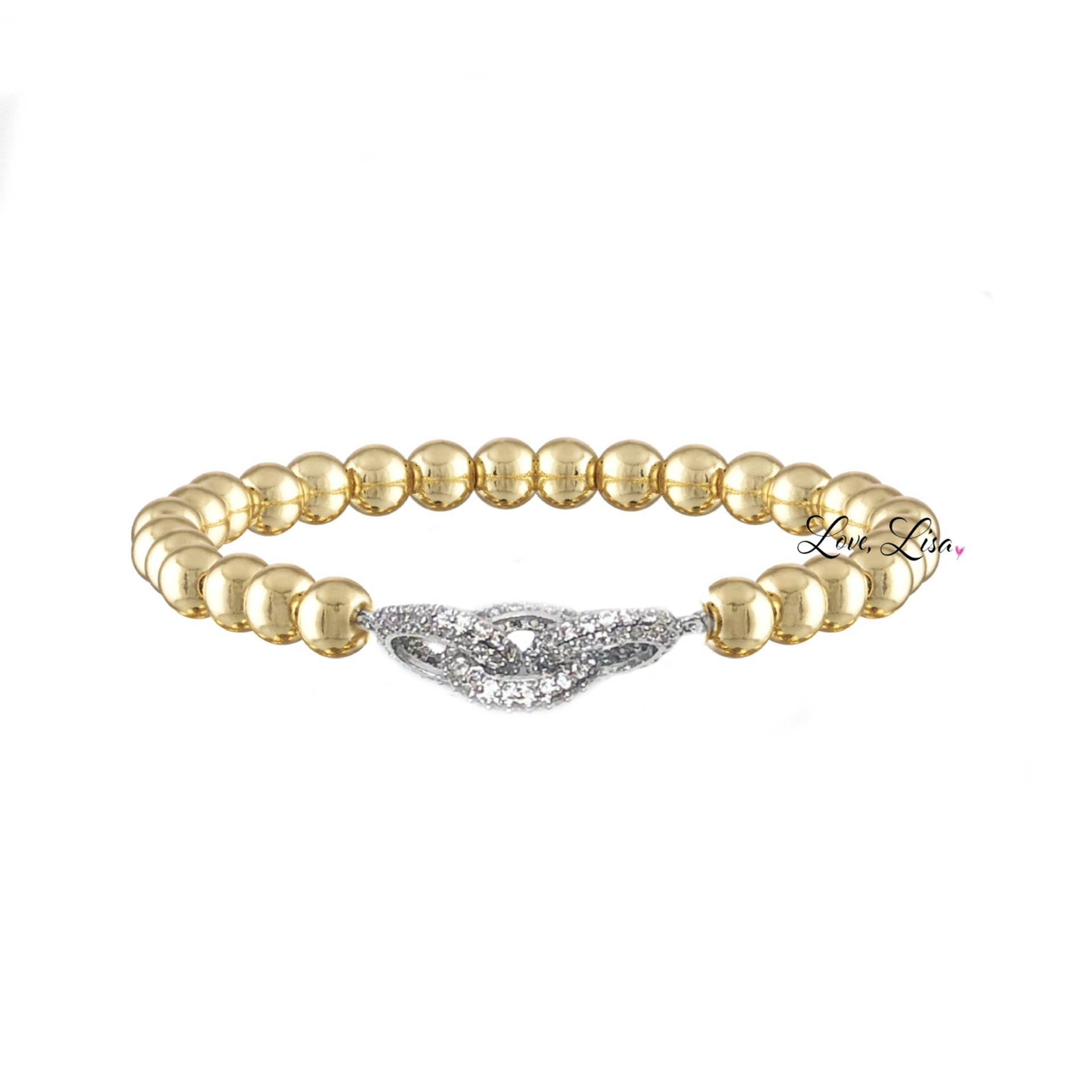 Love Lisa Silvania’s Link Bracelet in gold with pavé infinity charm