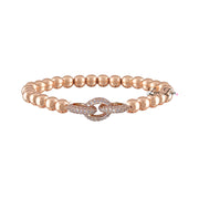 Love Lisa Silvania’s Link Bracelet in rose gold with pavé infinity charm