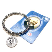 silver stretch saint padre pio healing bracelet shown with prayer card love lisa