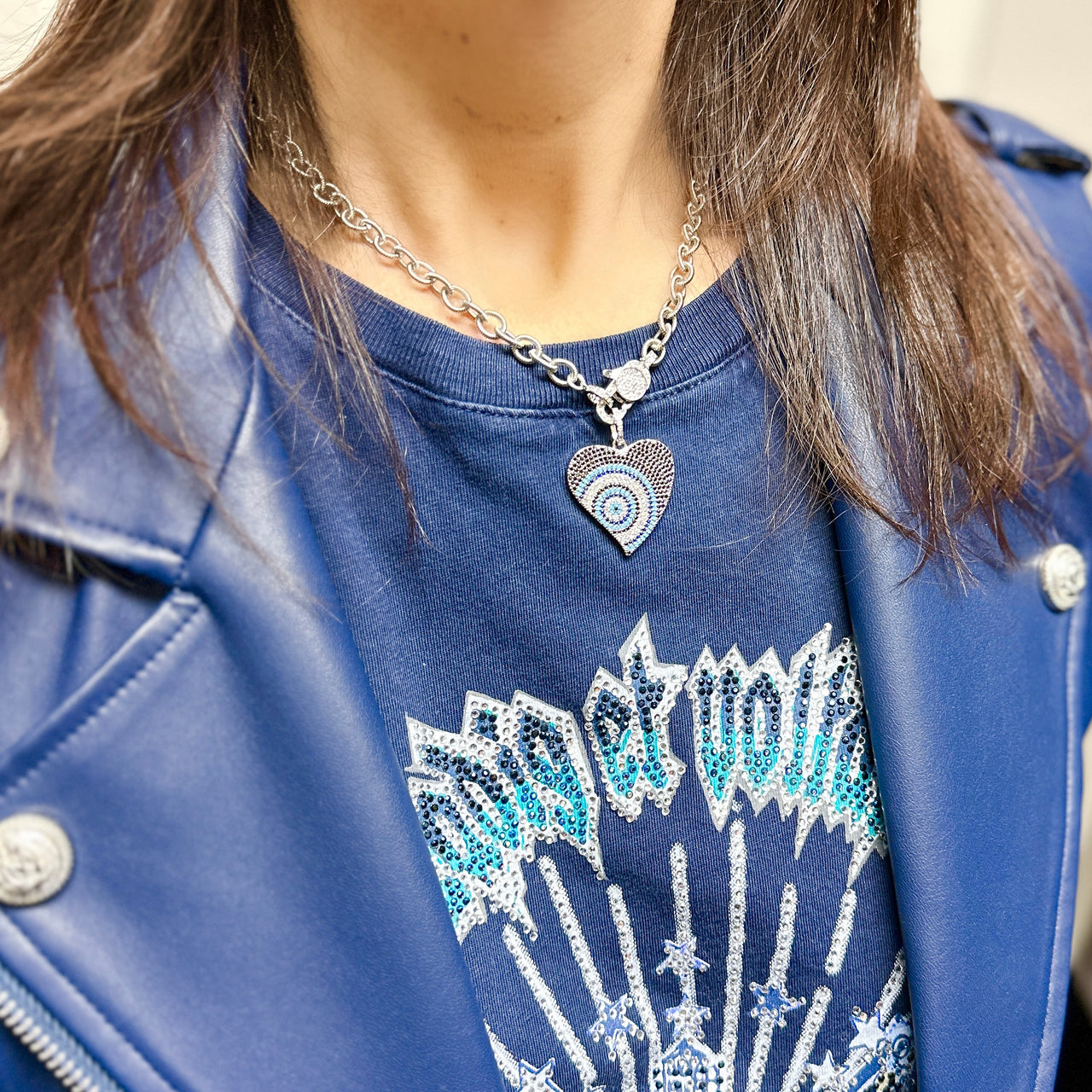 Love Lisa Steph heart protection necklace worn layered showing pavé heart evil eye charm