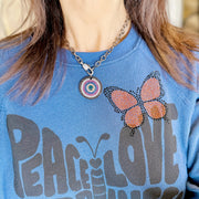 multicolor evil eye necklace on model