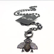 Queen Bee Charm styled on a gunmetal lobster clasp chain with Love, Lisa tag