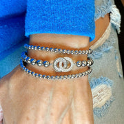 love lisa together forever diamond and baguette beaded bracelet stacked with gold and silver bracelets