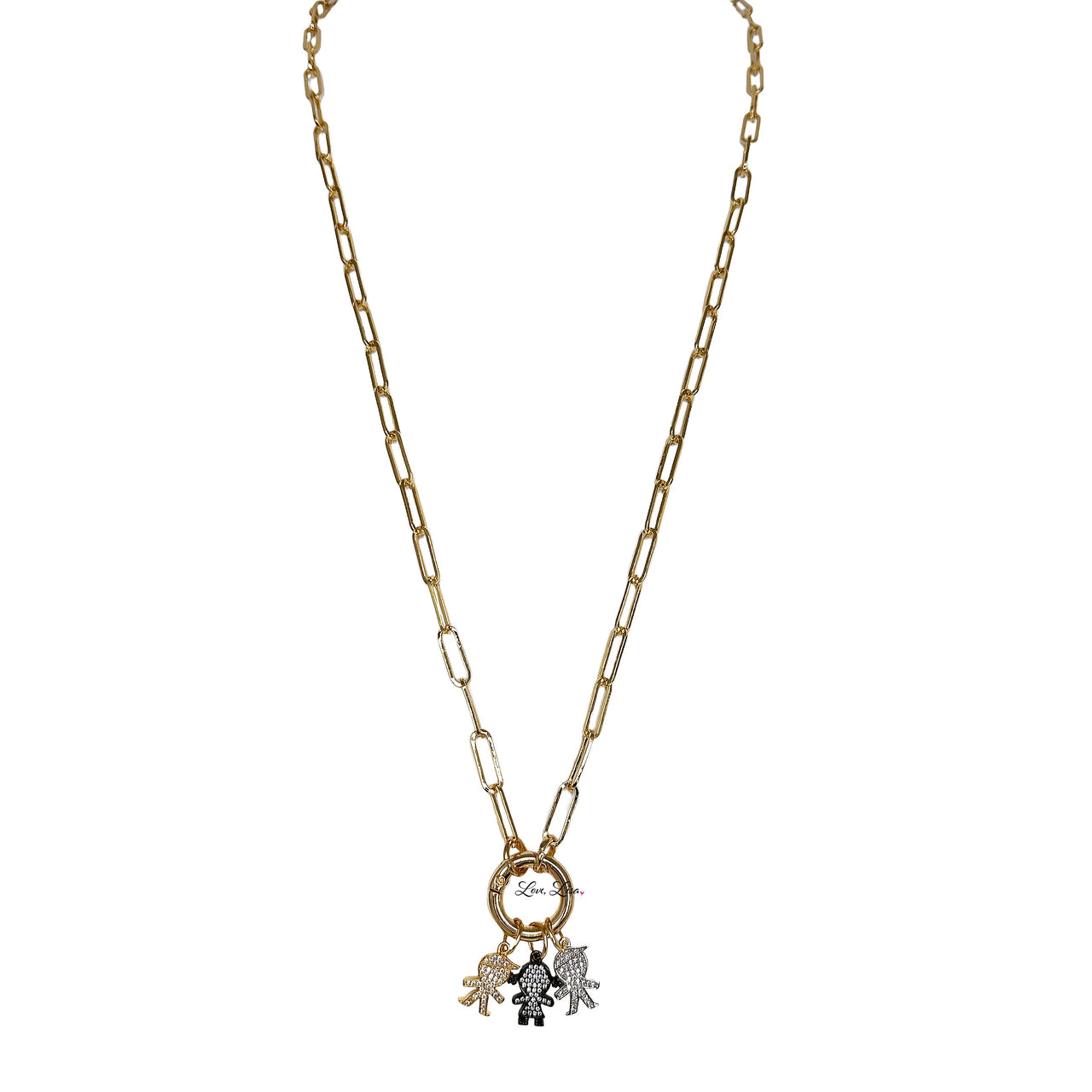 A gold-colored necklace with a lobster clasp, featuring a charm with a bear and the moon.